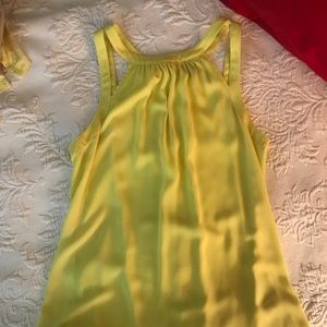 Silky stappy tank with cut out shoulder detail.